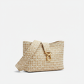Woven shoulder bag in beige and cream tones